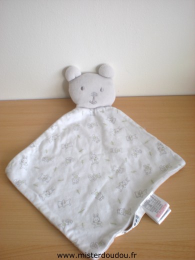 Cocoon Ours Tissus blanc motifs dessus, velours gris dessous - Très bon état
